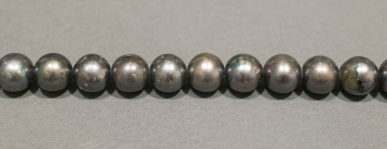 Perlenstrang Silbergrau rund mit hohem Lüster in 6-7 mm